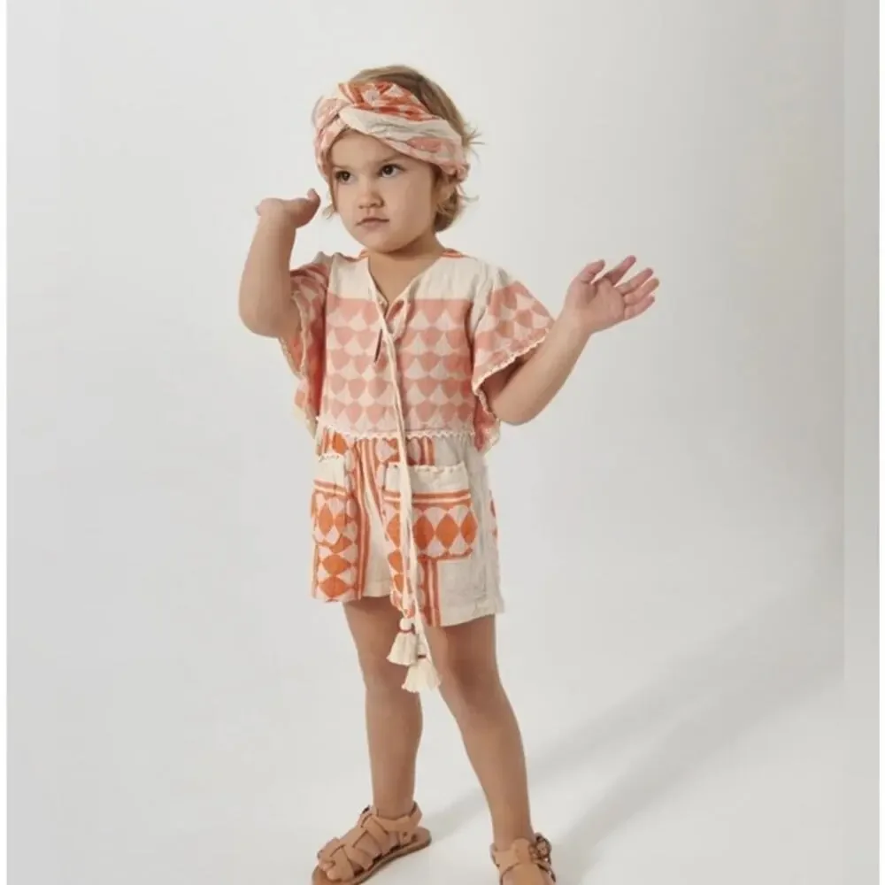Pearl and Caviar Baby Girl Size 2/4 Apricot Zakar Romper Orange Tassel